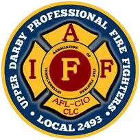 A logo of the upper darby professional fire fighters.